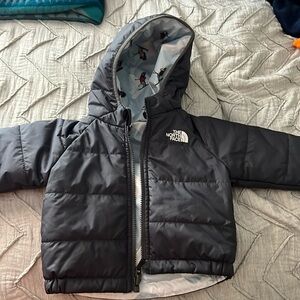 The North Fave reversible toddler puff jacket